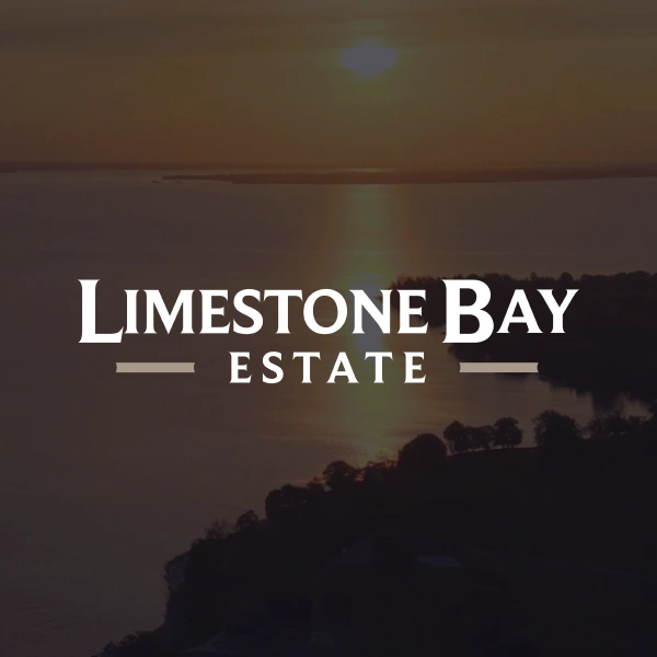 Limestone Bay logo with sunset background
